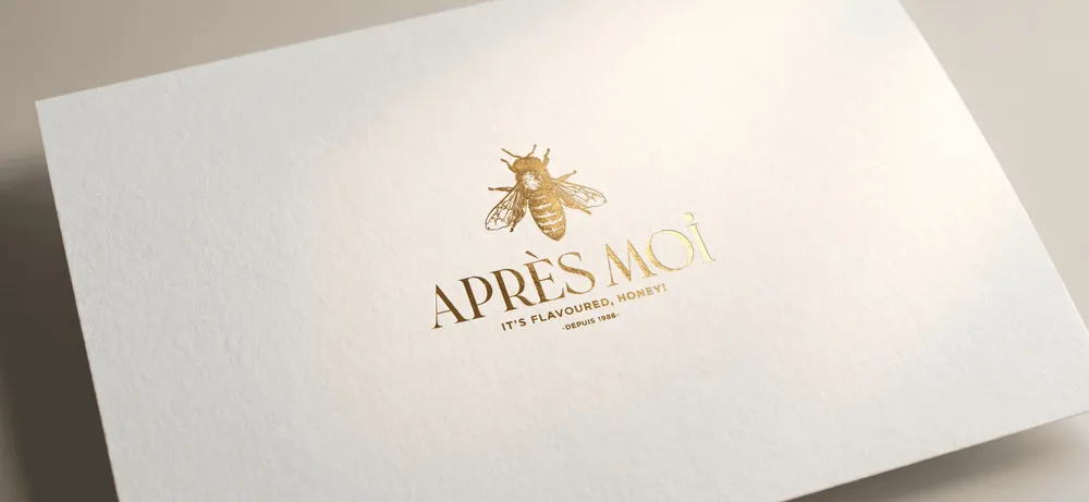 gold logo on paper